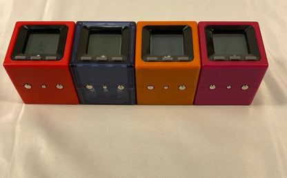Radica Cube World Set of 4 Vintage Handheld Electronic Games Toys Working New Batteries
