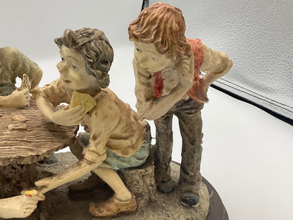 vintage resin sculpture titled "The Cheats" (or "The Cheaters") from the Misubanti Collection