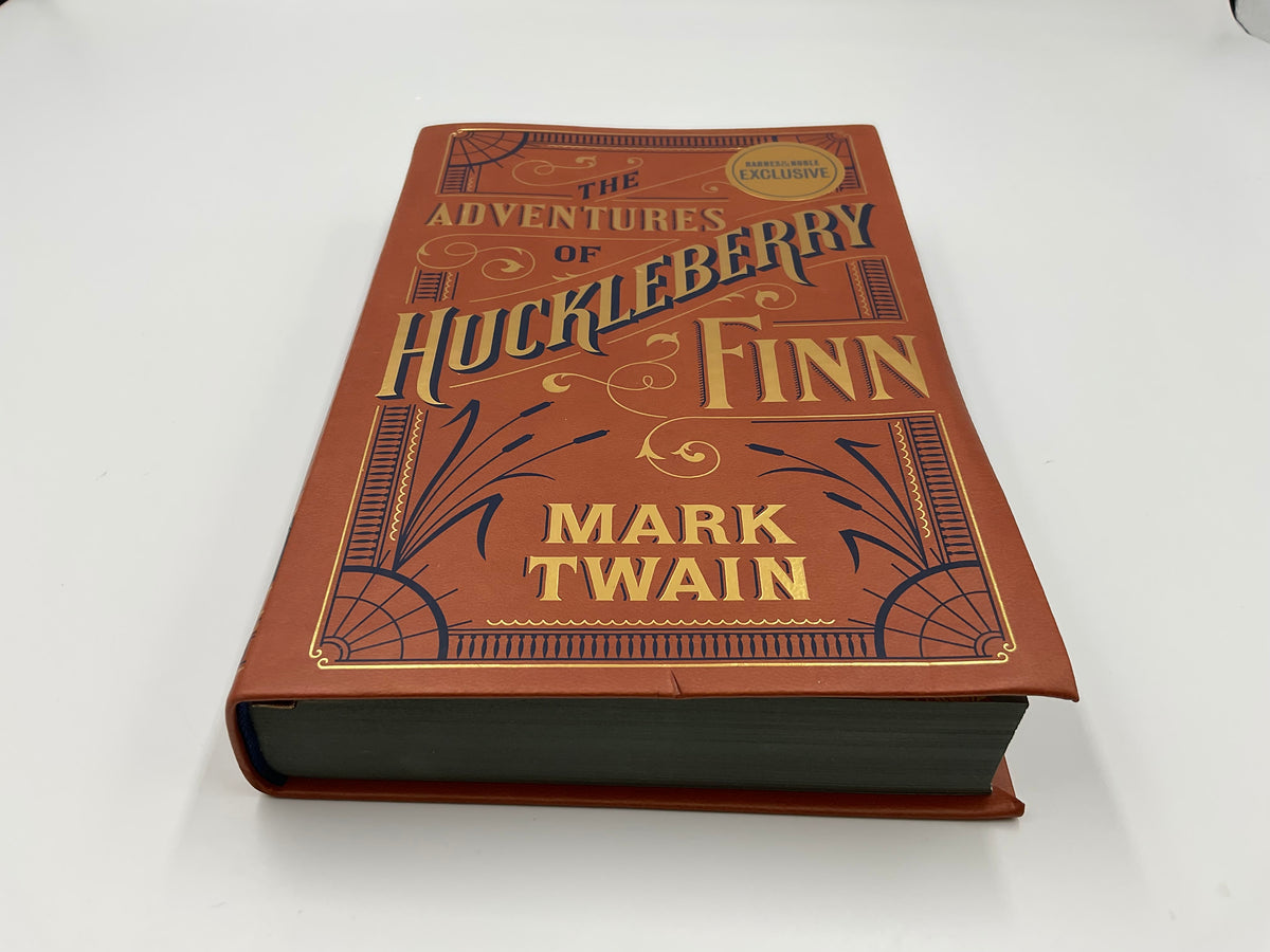 “The Adventures of Huckleberry Finn” by Mark Twain