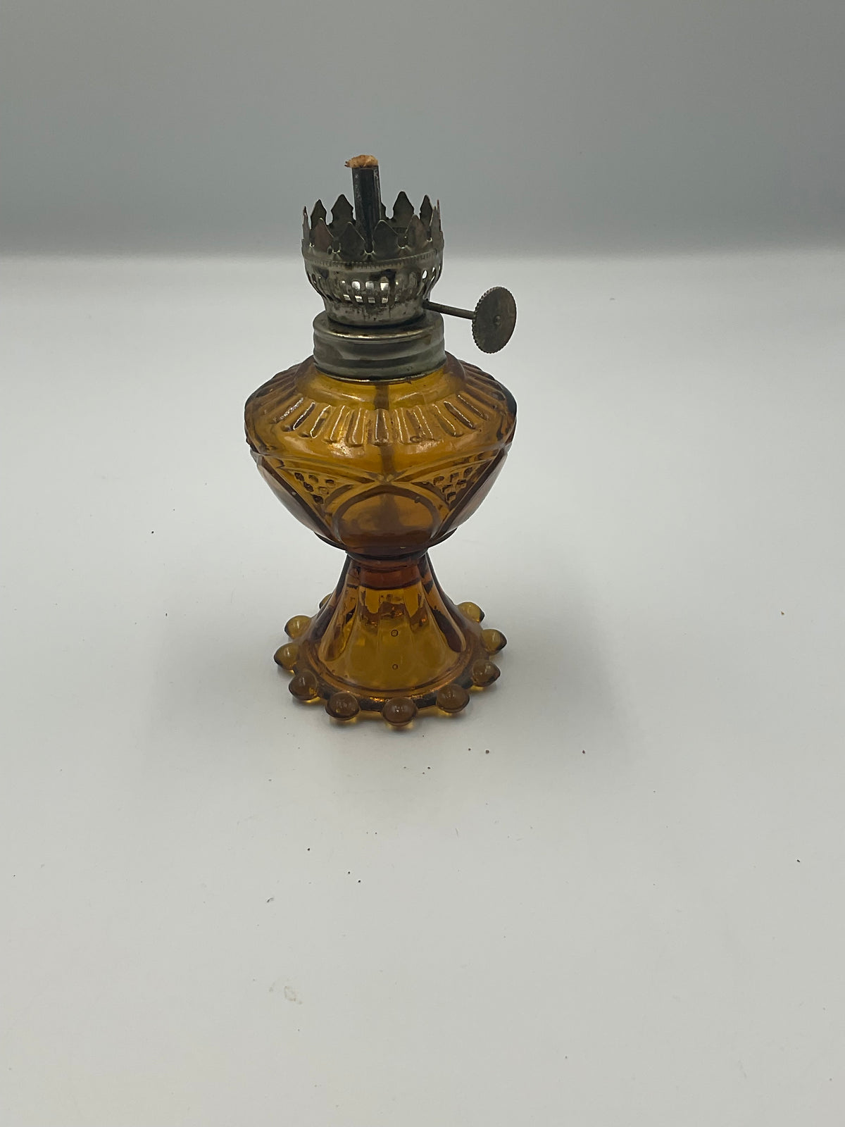 vintage amber pressed glass miniature oil lamp base and removable glass fuel reservoir