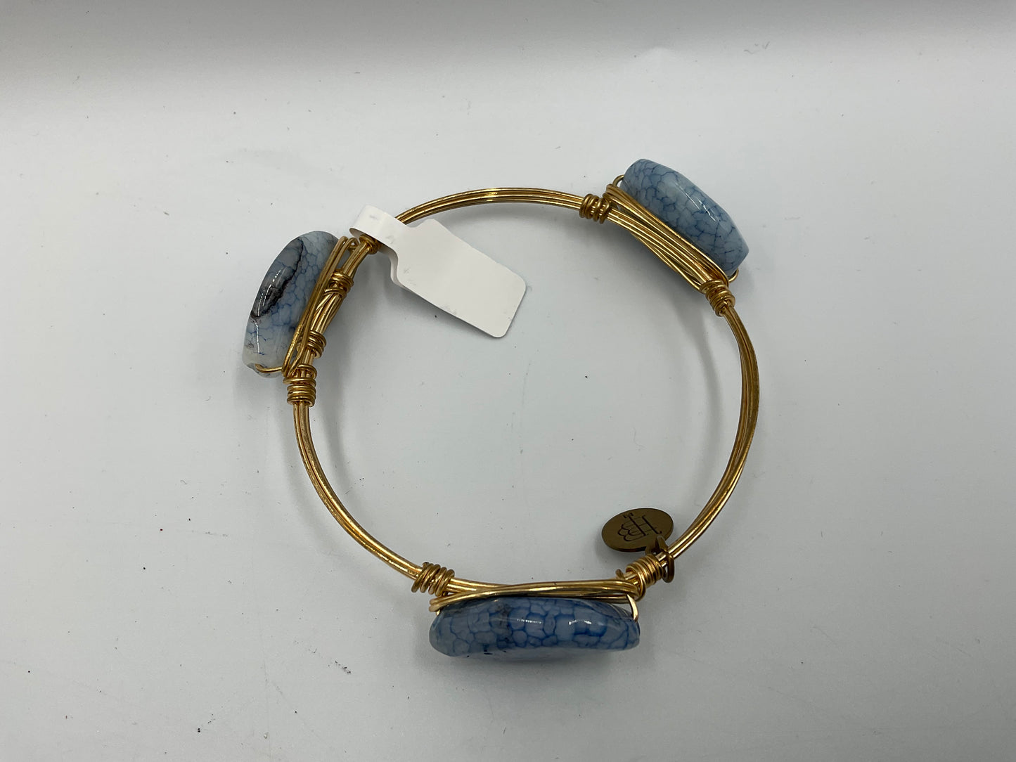 Bourbon and Boweties Bangle Gold Tone Wire Wrapped With Blue Marbled Stones