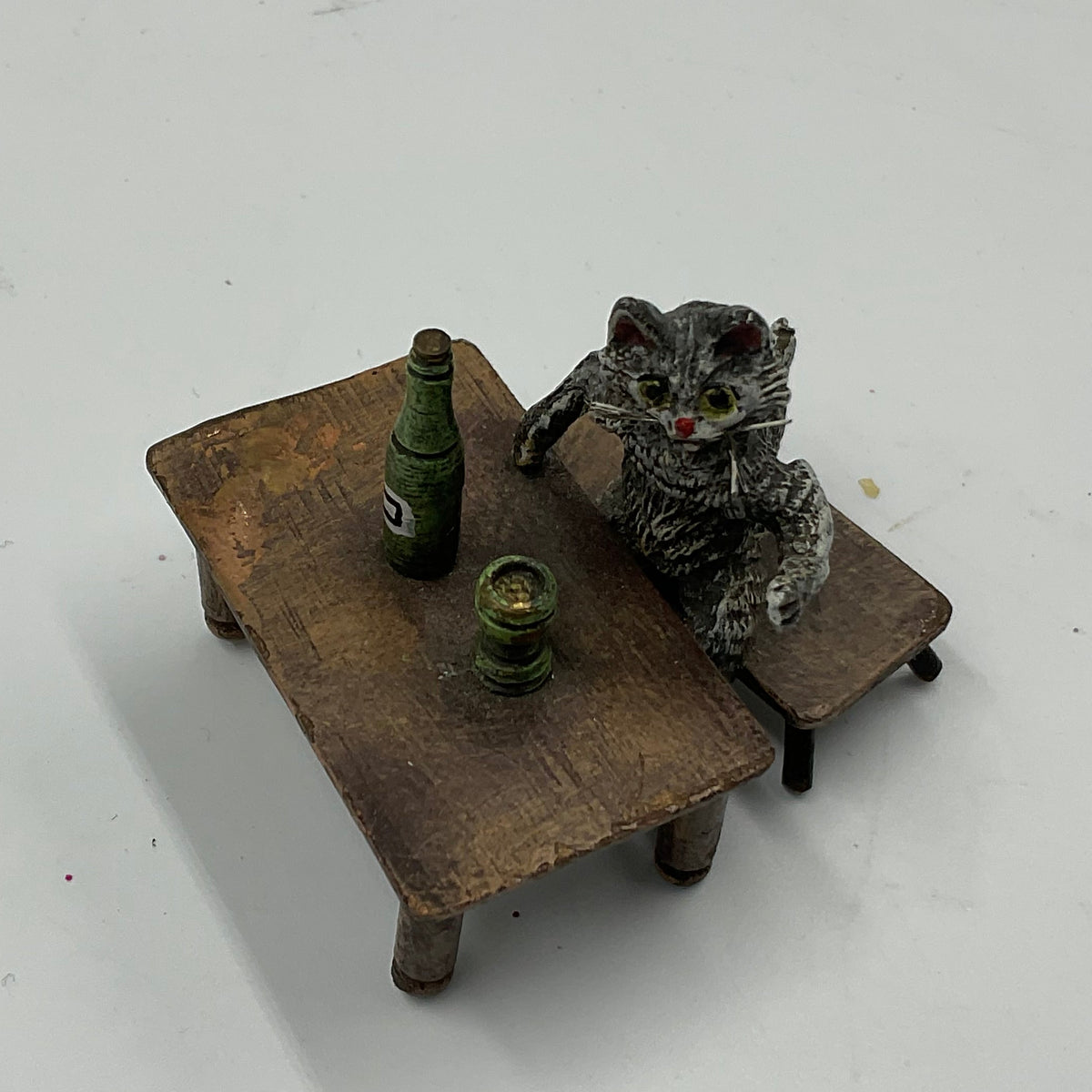 Miniature Cat Drinking at Table collectible figurine