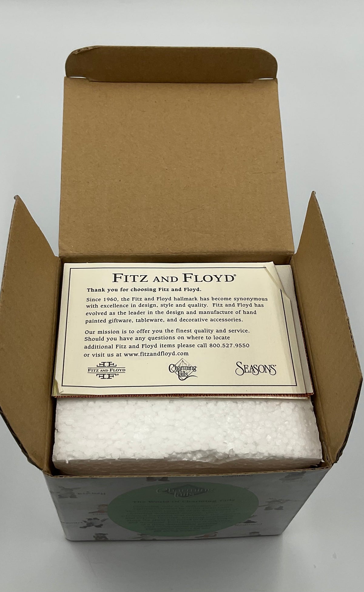 Collectible figurine kit from the Charming Tails collection by Fitz and Floyd