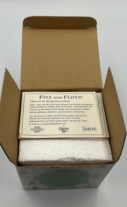 Collectible figurine kit from the Charming Tails collection by Fitz and Floyd