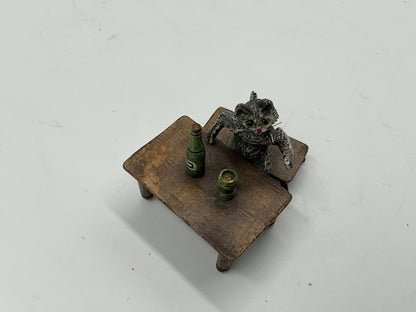 Miniature Cat Drinking at Table collectible figurine