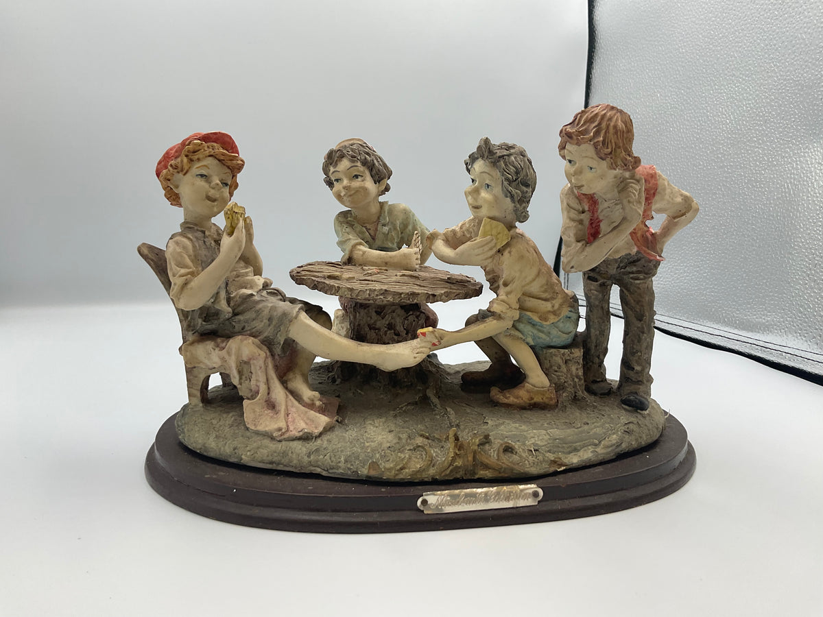 vintage resin sculpture titled "The Cheats" (or "The Cheaters") from the Misubanti Collection