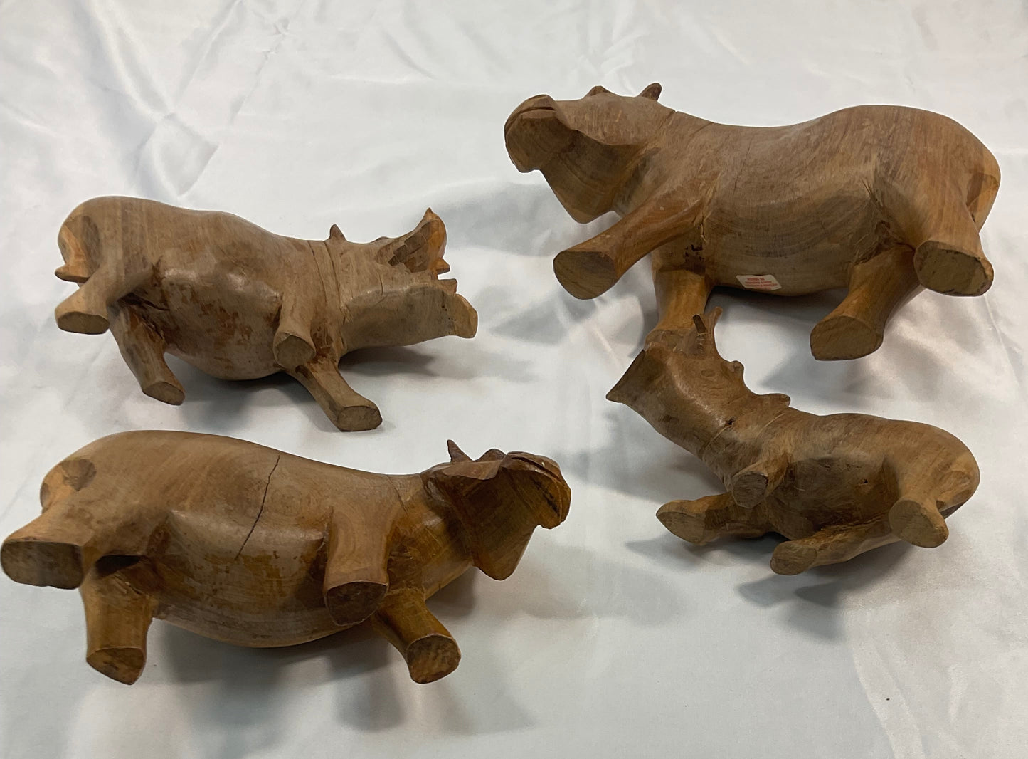 Genuine Besmo Wood Carvings Set of Four Hand-Carved Wooden Hippos Made in Kenya